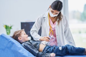 little-boy-having-usg-examination-by-pediatrician-2025-01-07-06-57-57-utc-min